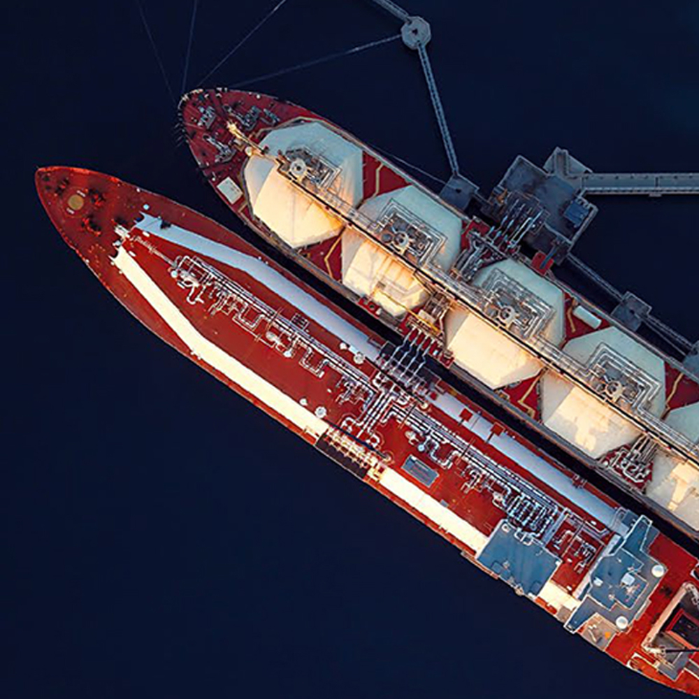 Overhead view of two tanker vessels at dock.